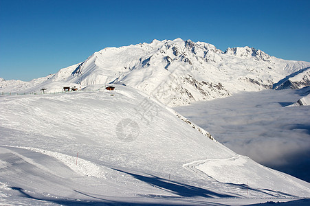 山山脉宽慰登山天空运动环境远足蓝色旅行滑雪风景图片