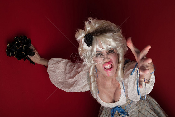 打扮成玛丽安托瓦内特的女人上诉假发戏剧头发袖子演员玩具帮助戏服卷发图片