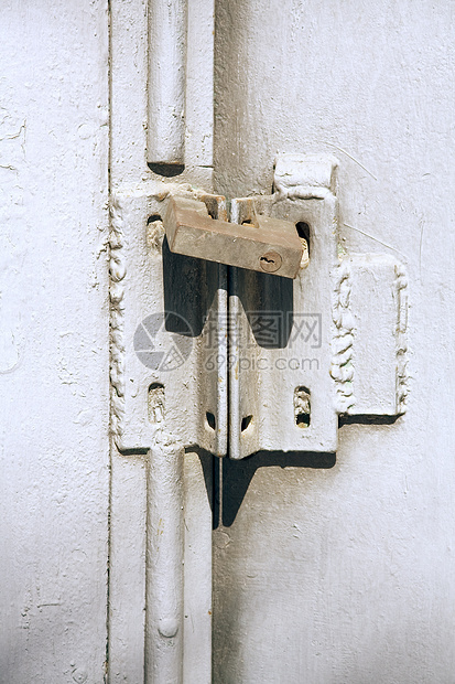 铁门建筑锁孔房子闩锁宏观挂锁入口力量历史警卫图片