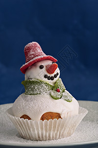 雪白雪人甜蜜帽子甜点糕点围巾背景图片