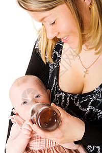 母乳喂养婴儿围兜喜悦家庭反射瓶子后代快乐孩子女孩享受图片