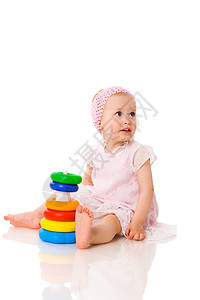 玩婴儿游戏童年婴儿女儿好奇心金字塔学习玩具乐趣喜悦金发图片