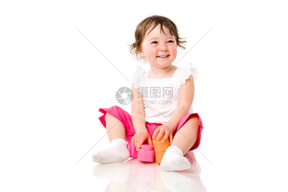 快乐的小女孩头发衣服女孩女儿玩具学习孩子儿童幸福好奇心图片