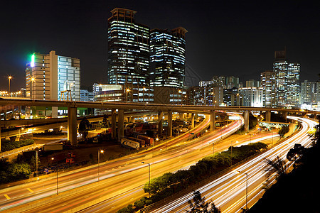 夜间与城市交接运输蓝色运动隧道街道戏剧性建筑速度公共汽车驾驶图片