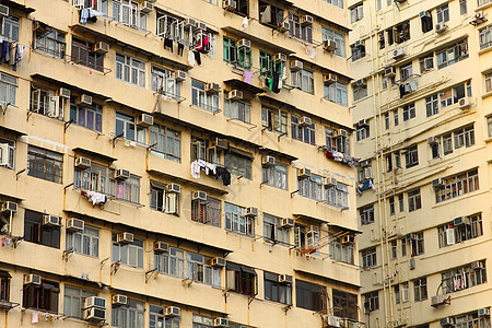 香港的旧公寓生活衣服高楼失业住宅建筑学邻里贫民窟市中心跑步图片