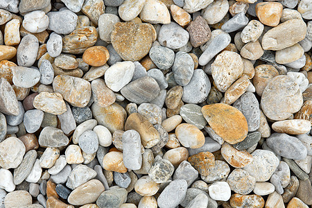 佩布圆形假期娱乐旅行鹅卵石碎石岩石海滩地面海岸图片