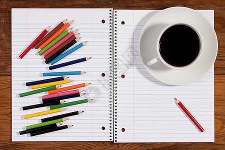 记录笔记本蓝色杯子棕色黄色绿色配饰螺旋红色学生咖啡图片