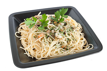 带海鲜的意大利面条贝类午餐餐厅草本植物食物香菜烹饪盘子乌贼食谱图片