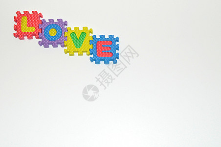 左上左手角的爱情连接区块蓝色绿色字母紫色红色积木黄色玩具电子背景图片