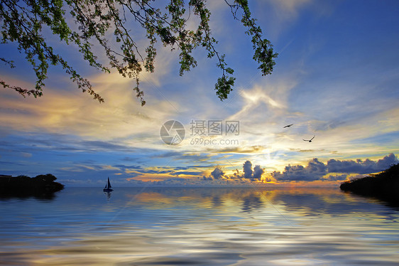 库拉索日落海岸海景海洋风景天堂阳光帆船支撑热带海滩图片