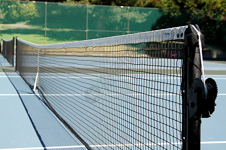 网球网闲暇白色场地黄色娱乐网球游戏运动图片