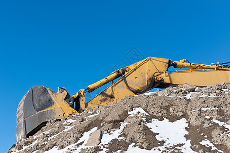 冬季的液压挖掘器设备水平照片地球挖掘机图片