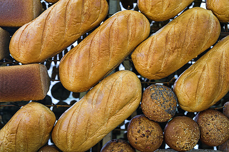 面包的鲜面包摊位产品市场店铺框架棕色杂货乡村金子圆形背景图片