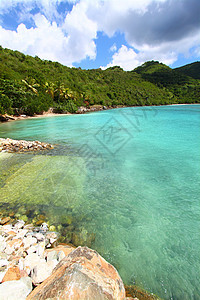 托尔托拉湾啤酒湾蓝色岛屿海洋旅行阳光爬坡环境啤酒商场景冲浪图片