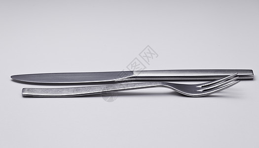 现代不锈钢刀和叉金属桌子反射环境刀具厨房餐具叉子白色银器图片