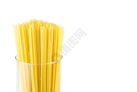意大利长面条玻璃容器上的意大利面糊食物黄色美食产品烹饪面条小麦白色糖类背景