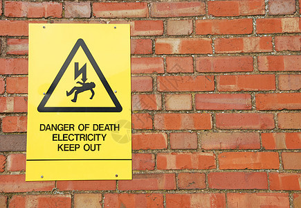 高压电压标志三角形力量死亡危险电气石头禁令风化警告工程图片