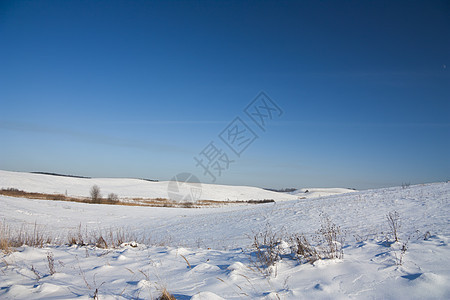 冬季风景天空地平线下雪阳光季节土地阴影蓝色场景天气图片