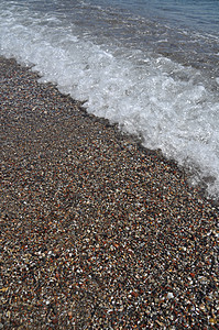 海滩风景石头岩石假期鹅卵石场景旅游海浪海岸线海景图片