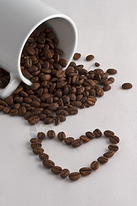 咖啡杯 咖啡豆和心脏图片
