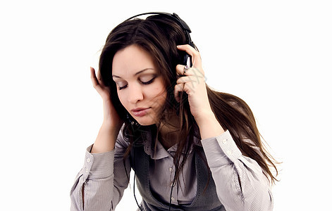 使用耳机的年轻女孩女性收音机流行音乐立体声享受韵律音乐家记录闲暇玩家图片