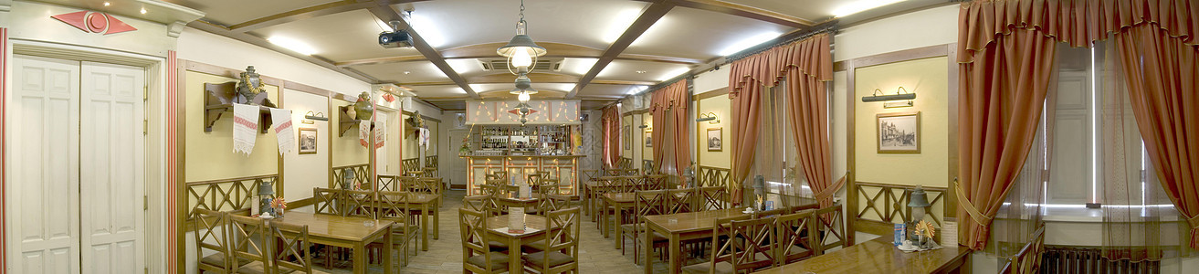 餐厅大厅窗帘盘子桌子建筑装饰奢华木头座位食物庆典图片