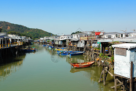 香港Tai O渔业村木头天空旅行场景钓鱼棚户区村庄风化房子住宅图片