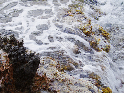冲撞珊瑚礁的海水波浪波纹花岗岩自由海景火花风景悬崖飞沫雕塑雕刻图片