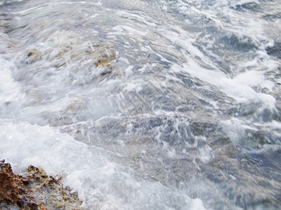 冲撞珊瑚礁的海水波浪海洋波纹花岗岩自由碰撞雕刻雕塑风景飞沫泡沫图片