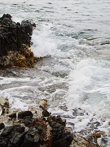 冲撞珊瑚礁的海水波浪嘶嘶风景石头潮汐雕塑火花发泡波纹泡沫天堂图片