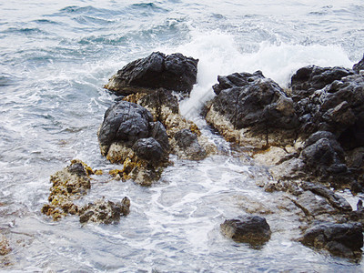 冲撞珊瑚礁的海水波浪花岗岩火花海景雕塑嘶嘶天堂发泡潮汐飞沫力量图片