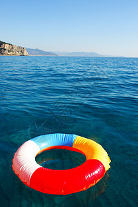 游泳环戒指阳光假期救援浮标救命海洋蓝色水池安全图片