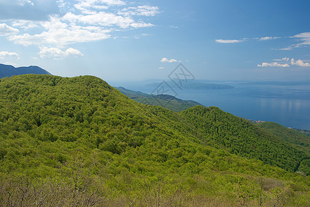 山山脉宽慰自由远足全景树木海洋晴天土地旅行顶峰图片