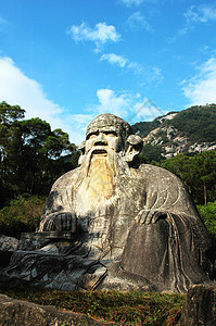 老挝巨雕像石头天空旅行雕塑旅游老子胡须蓝色祖先宗教图片
