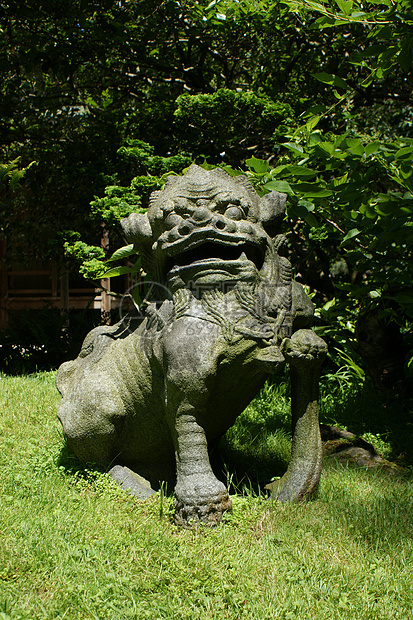 狮子的日本石像艺术寺庙文化雕塑传统警卫古董牙齿动物石头图片