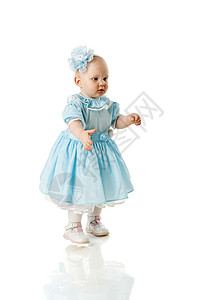 托德勒女孩孩子蓝色惊喜幸福婴儿乐趣白色好奇心女孩们裙子图片