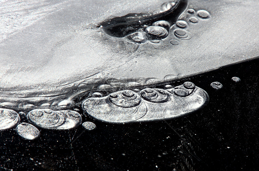 冰面反射抽象设计白色圆圈玻璃宏观图片