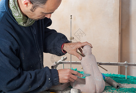 雕塑家精神工作艺术男人创造力作坊石头工人雕刻工艺图片