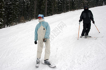 滑雪者女孩雪刀娱乐滑雪下坡运动女士高山旅行男人图片