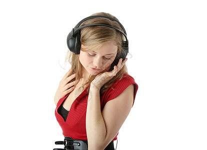 收听音乐女性音乐播放器文化乐趣手机青年头发女士闲暇耳机图片
