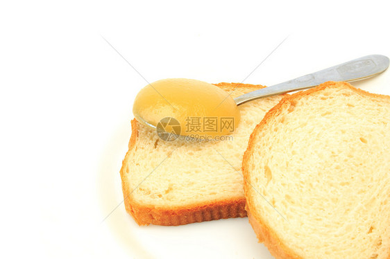 带蜂蜜的白面包面团早餐午餐面包食物厨房饮食粮食烹饪营养图片