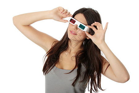 戴3D眼镜的妇女女孩观众电影娱乐成人女士屏幕乐趣享受技术图片