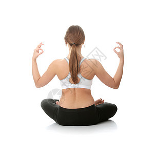 做瑜伽锻炼的年轻美女女性卫生专注活力健身房训练平衡身体姿势乐趣图片