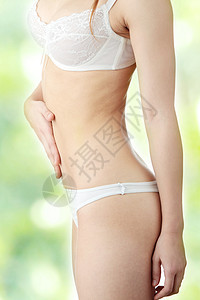 手放在肚子上消化腰部身体肥胖女性腹部腰围滋养减肥饮食图片