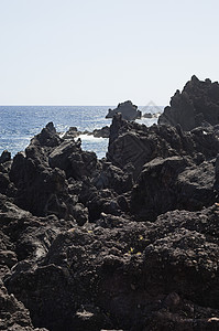 火山岩海洋海岸线悬崖岩石蓝色海景边缘海岸地质黑色图片