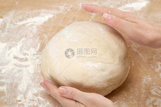 Kneading 面金生活食物烹饪厨房女士手指面包师烘烤面粉图片