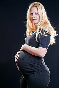 怀孕孕妇的肚子孩子裙子母亲新生活成人腹部快乐黑色幸福开端图片