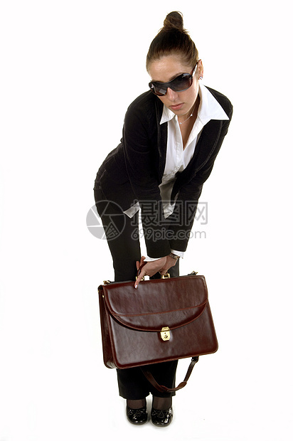 女商务人士对公事包的关心衣服商业生意人女性职业装工作室休闲装公文包女士白色图片