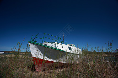 里弗顿马尼托巴附近海滩渔船商业岛屿水平旅行美术树木假期图片