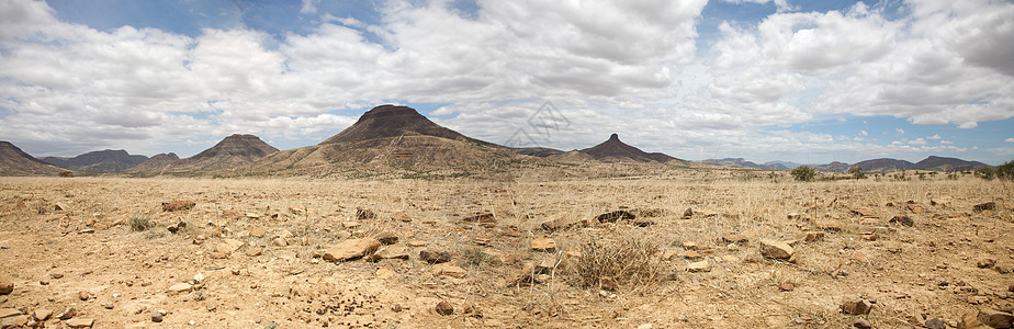 纳米比亚Kaokoland游戏保护区的超真实全景旅游蓝色旅行岩石风景爬坡地平线孤独荒野干旱图片